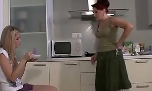 Blonde teen and mom go lesbian on kitchen