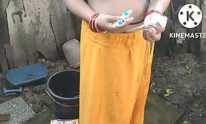 Anita yadav bathing outside around hot