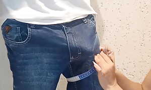 couturiere measuring customer's pants helter-skelter erection